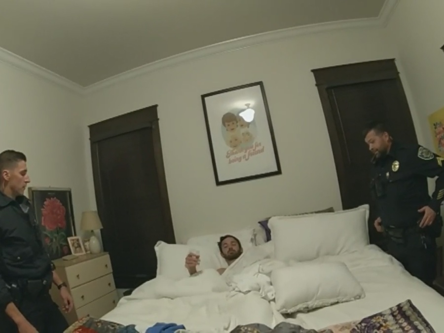 Police bodycam footage shows John Tyson is woken and arrested
