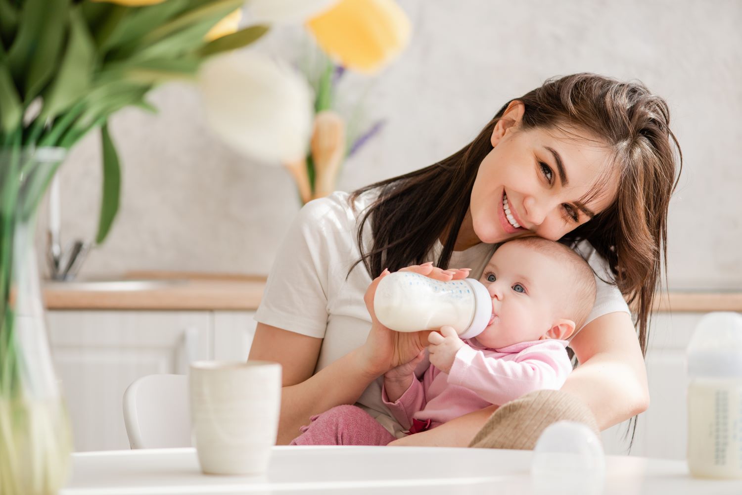 Grocery In 2024 What Can We Expect Just Food   Woman Feeding Her Baby 