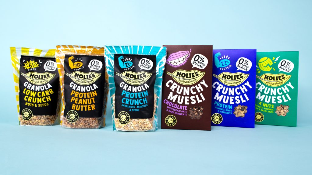 packs of granola on light blue background.