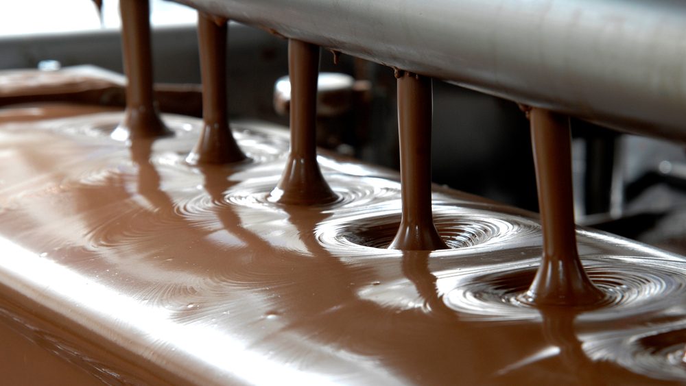 Melted chocolate poured in a factory